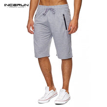 Shorts Men 2018 Summer Solid Men Shorts Casual Loose Bermuda Masculina Beach Drawstring Zipper Shorts Classic Knee Length Shorts