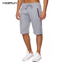 Shorts Men 2018 Summer Solid Men Shorts Casual Loose Bermuda Masculina Beach Drawstring Zipper Shorts Classic Knee Length Shorts