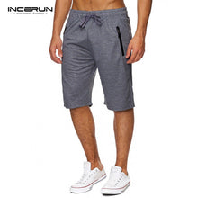 Shorts Men 2018 Summer Solid Men Shorts Casual Loose Bermuda Masculina Beach Drawstring Zipper Shorts Classic Knee Length Shorts